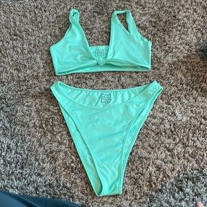 Oh Polly turquoise bikini. Small top& medium bottoms. Never worn.